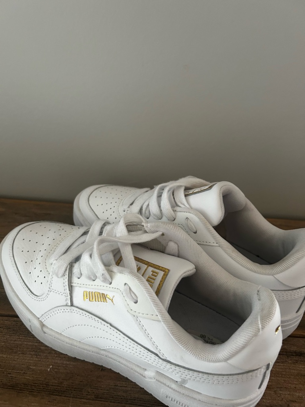 Puma Kids White Sneakers with Gold Logo